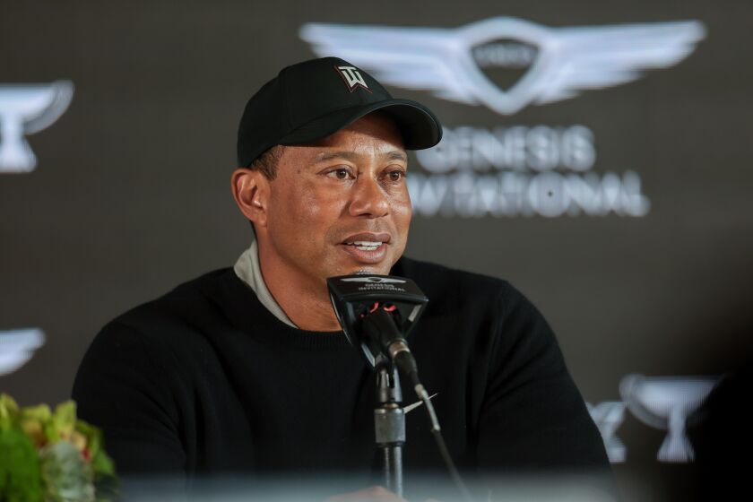 Tiger Woods speaks during a news conference at Riviera Country Club.