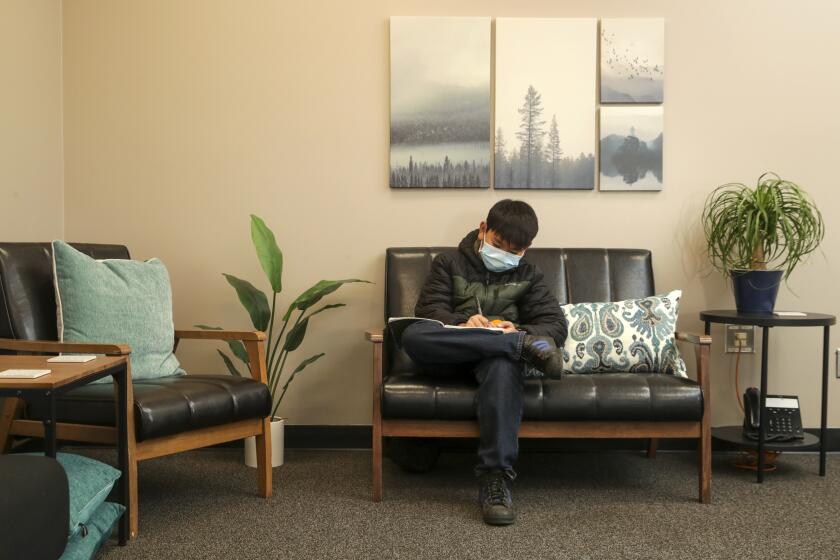 Garden Grove, CA - February 04: A calming room where students can relax and grapple with any depression, anxiety and grief at John Murdy Elementary on Friday, Feb. 4, 2022 in Garden Grove, CA. (Note: Sixth grade student Thomas Tran, 12, was not in any stress. He was brought in just for demonstration)(Irfan Khan / Los Angeles Times)