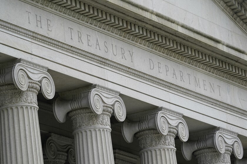 FILE - This May 4, 2021, photo shows the Treasury Building in Washington. The U.S. budget deficit hit a record $2.06 trillion through the first eight months of this budget year as coronavirus relief programs drove spending to all-time highs. The shortfall this year is 9.7% higher than the $1.88 trillion deficit run up over the same period a year ago, the Treasury Department said Wednesday, June 9, 2021 in its monthly budget report. (AP Photo/Patrick Semansky, file)