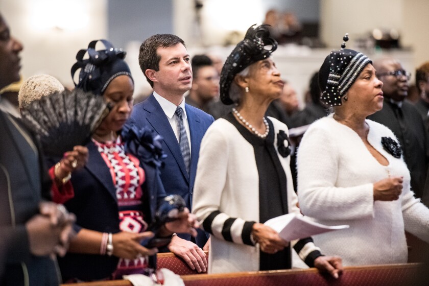 Democratic presidential hopeful Pete Buttigieg joins black worshipers at a service in Rock Hill, S.C.