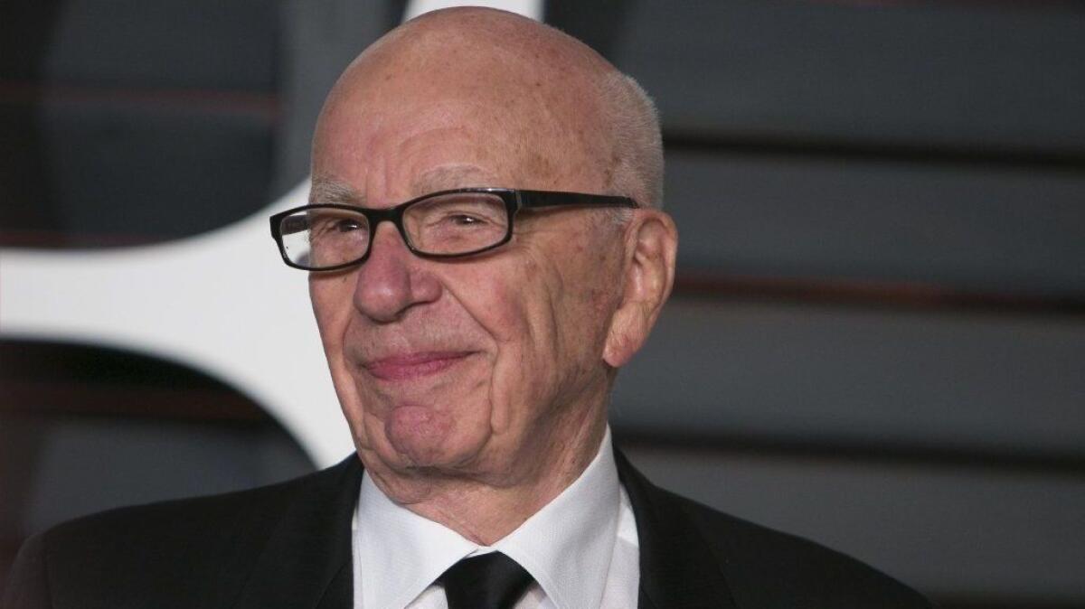Rupert Murdoch arrives at the Vanity Fair Oscar party in Beverly Hills on Feb. 22, 2015.
