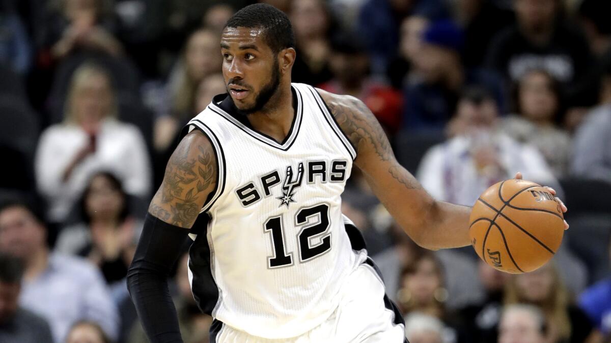 Spurs forward LaMarcus Aldridge brings the ball up court during a game against the Pacers on March 1.