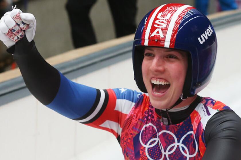 American Erin Hamlin celebrates her bronze-medal finish in luge at the Sochi Winter Olympic Games on Tuesday.