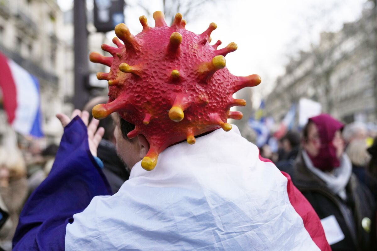 Demonstrators in France voice opposition to the new vaccine pass and mandatory vaccine.
