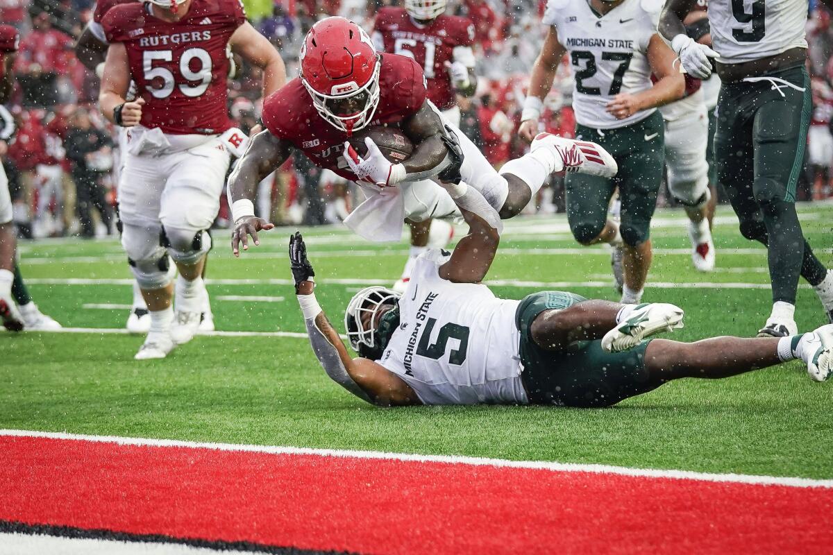 No. 3 Ohio State rallies from halftime deficit to beat Rutgers