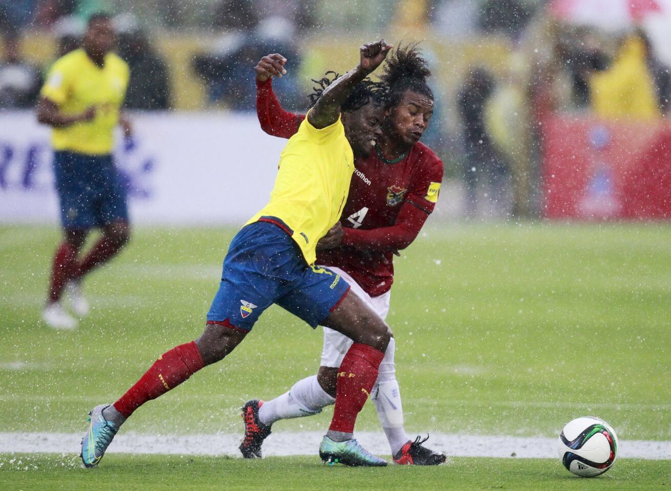 Ecuador's Paredes fights for the ball with Bolivia's Morales during their 2018 World Cup qualifying soccer match between Ecuador and Bolivia at the Atahualpa stadium in Quito