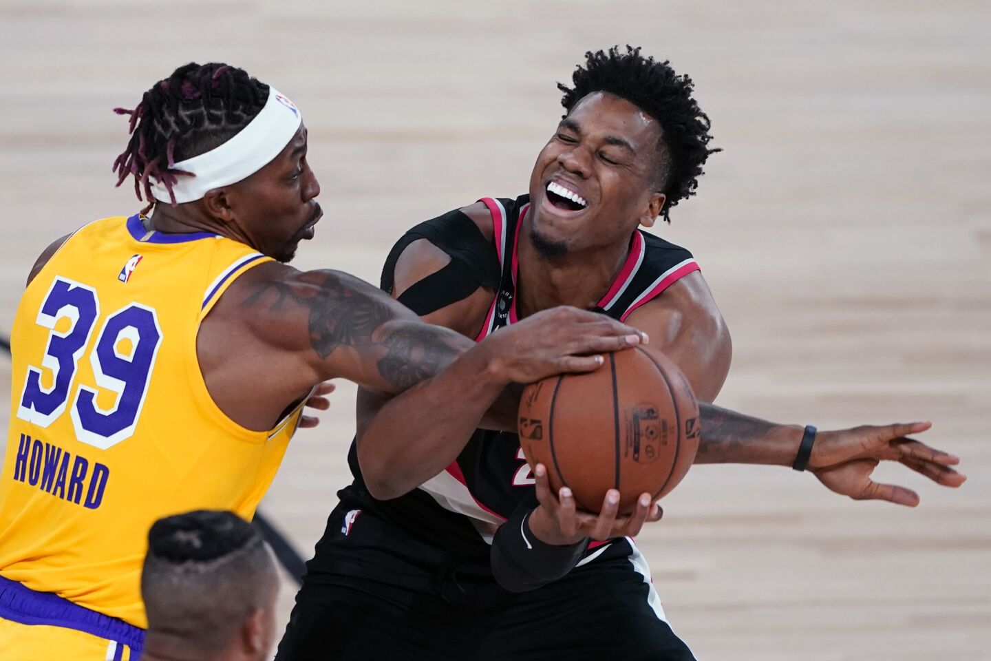Lakers center Dwight Howard, left, battles with Portland Trail Blazers center Hassan Whiteside during the second half.