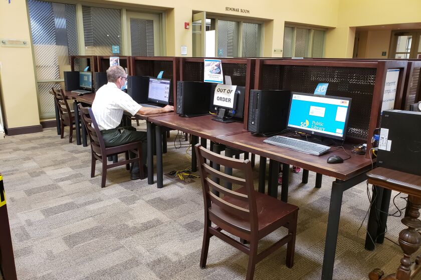 Every other computer is removed to insure social distancing when using them at the La Jolla Library.