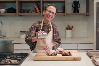 Nancy Silverton dusts croissants with powdered sugar