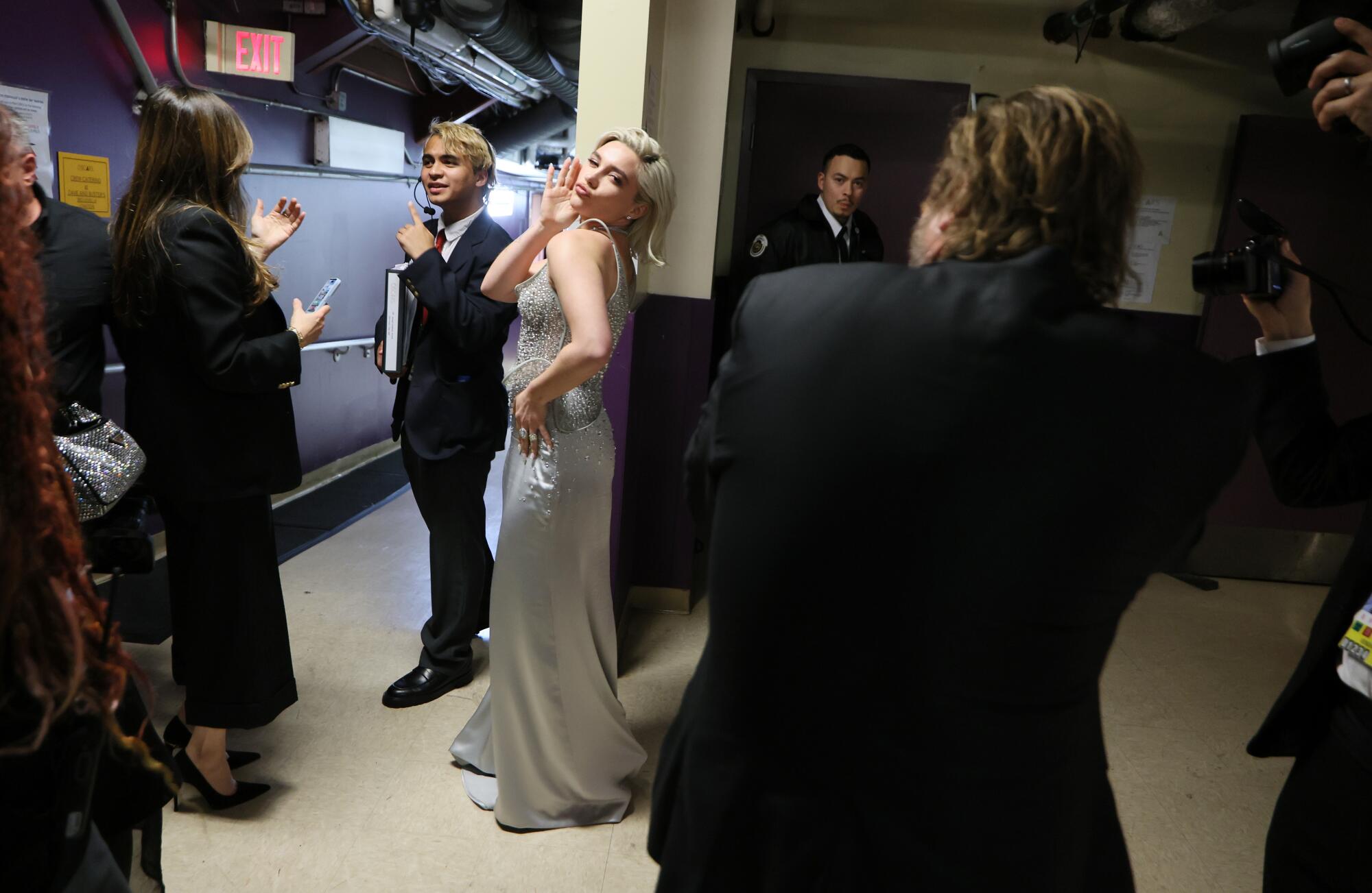 Florence Pugh poses for a photo back stage during the the 96th Annual Academy Awards.