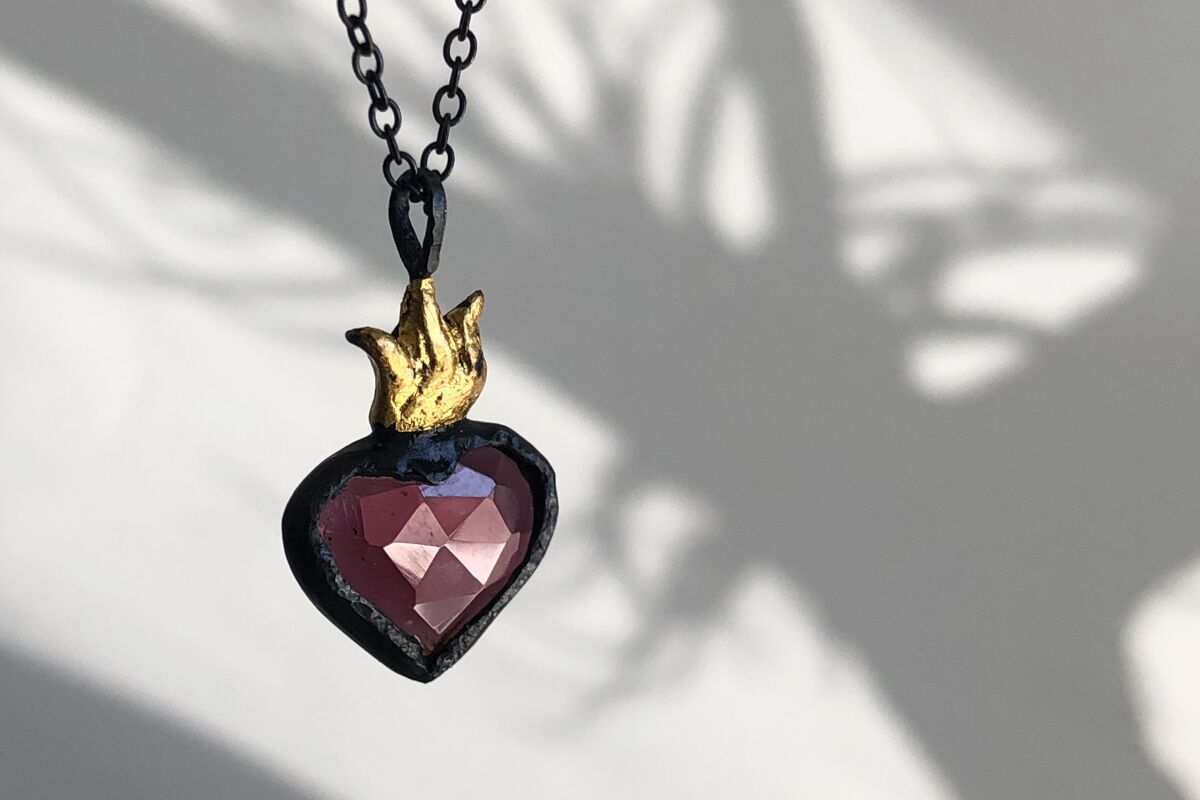 A heart-shaped necklace. 