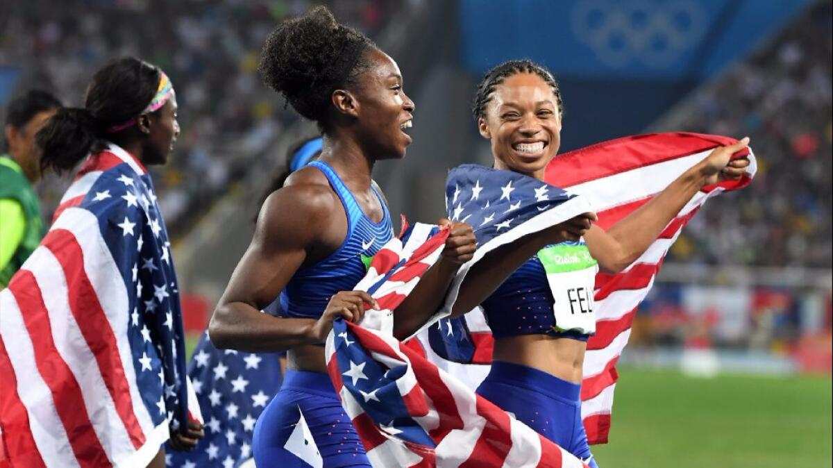 Tianna Bartoletta and Allyson Felix, right, celebrate after winning gold in the women's 400-meter relay at the 2016 Summer Games.