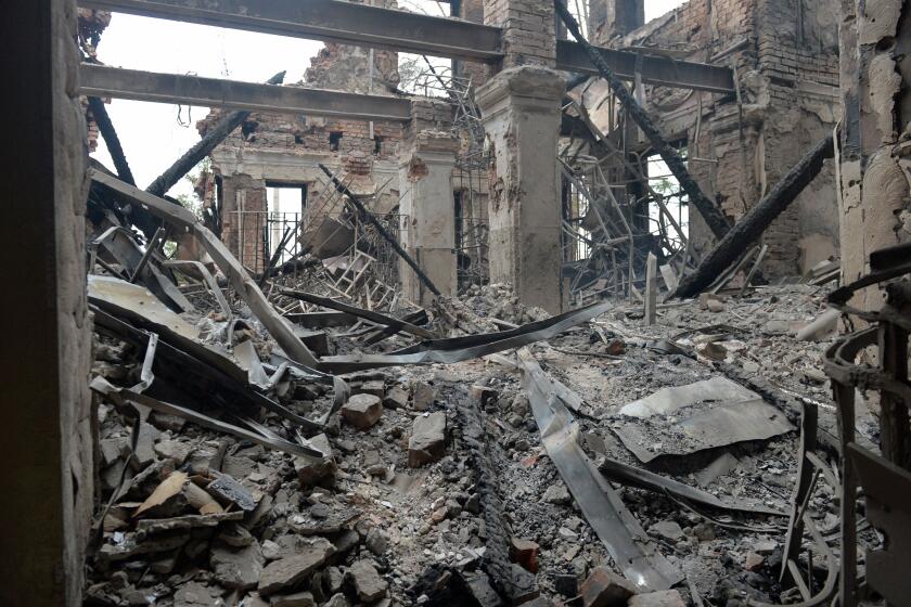 This photograph shows a view of a school destroyed as a result of fight not far from the centre of Ukrainian city of Kharkiv, located some 50 km from Ukrainian-Russian border, on February 28, 2022. (Photo by Sergey BOBOK / AFP) (Photo by SERGEY BOBOK/AFP via Getty Images)