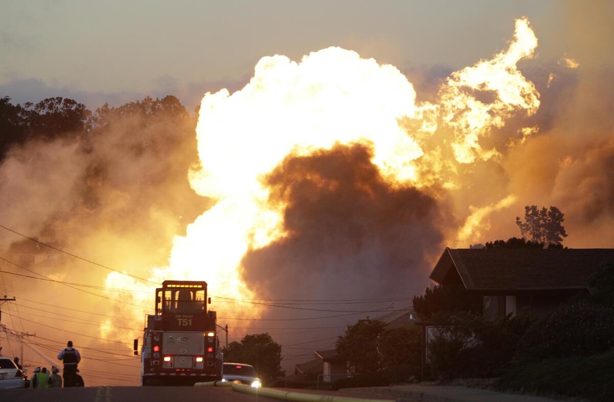 In this Sept. 9, 2010, photo, a massive fire roars through a mostly residential neighborhood in San Bruno.
