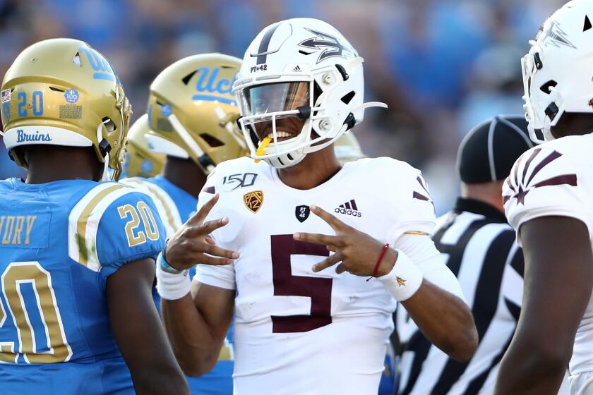 LOS ANGELES, CALIFORNIA - OCTOBER 26: Jayden Daniels #5 of the Arizona State Sun Devils reacts after scoring a rushing touchdown during the first half of a game against the UCLA Bruins on October 26, 2019 in Los Angeles, California. (Photo by Sean M. Haffey/Getty Images)