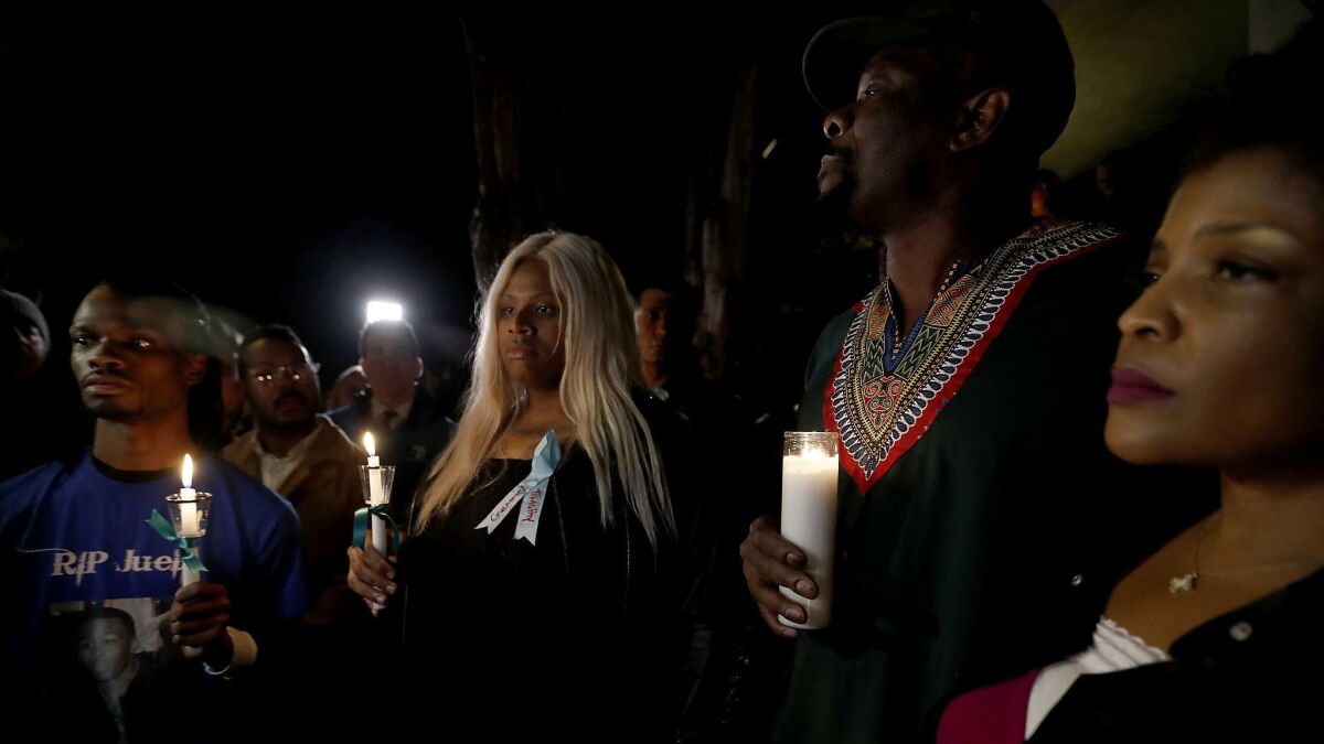 Ashlee Marie Preston, center, at a Jan. 11 candlelight vigil outside Ed Buck's apartment, said he once took her aside to show her video of a man she believed was smoking meth.