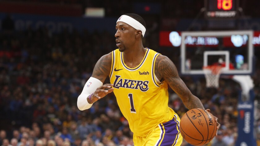 Lakers guard Kentavious Caldwell-Pope (1) works with the ball during a game Nov. 22 against the Thunder.