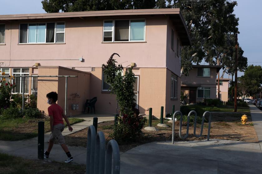 LOS ANGELES, CA - AUGUST 18: Apartments are seen at the Mar Vista Gardens public housing complex where some residents are worried about a possible change in mail delivery that would stop bringing letters to residents' doors, instead bring them to centralized banks of mailboxes in the complex on Tuesday, Aug. 18, 2020 in Los Angeles, CA. (Dania Maxwell / Los Angeles Times)