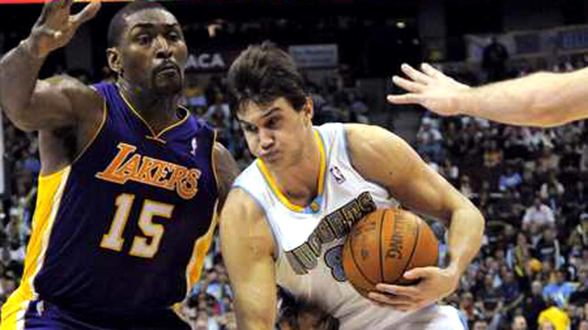 Danilo Gallinari, driving to the basket against Lakers forward Metta World Peace, is coming off his two best scoring seasons when he averaged 18.2 and 19.5 points a game.