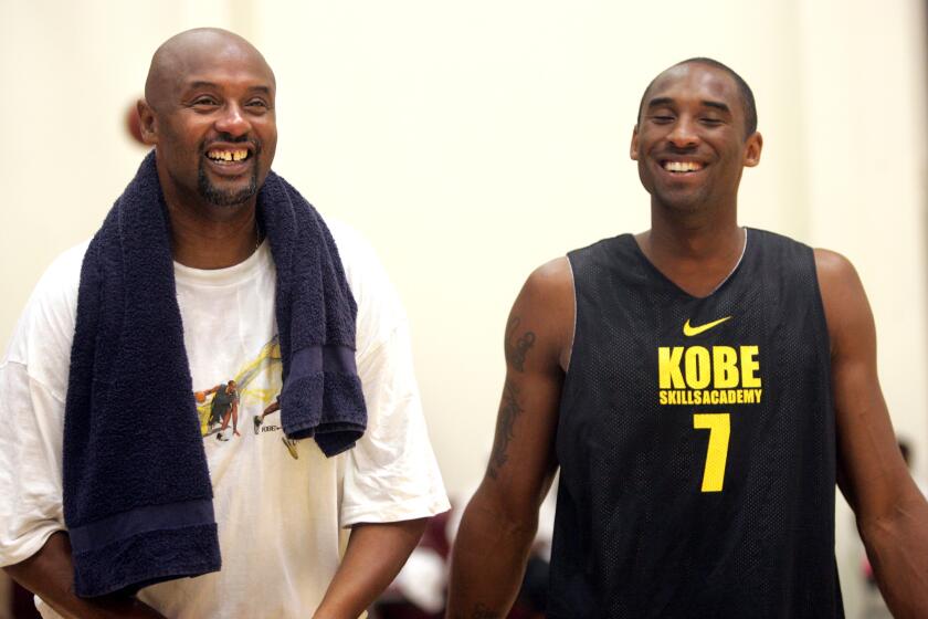Kobe Bryant with his father, Joe "Jellybean" Bryant at Loyola Marymount University on July 5, 2007. 