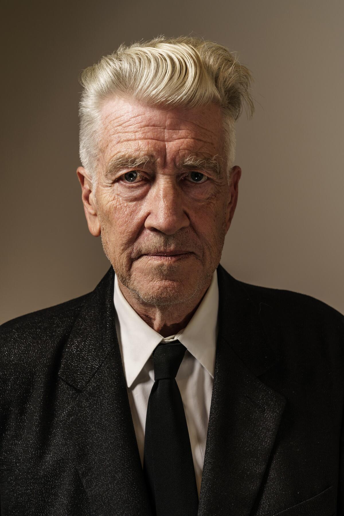 David Lynch poses for a portrait in front of his show, "I Was A Teenage Insect" in 2018.