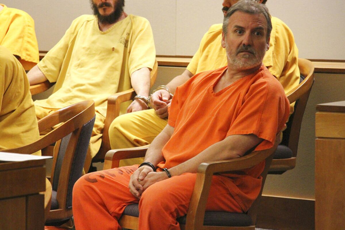 Brian Steven Smith sits in a courtroom Oct. 21 in Anchorage.  Police said Smith, 48, told them where he left the body of Veronica Abouchuk.