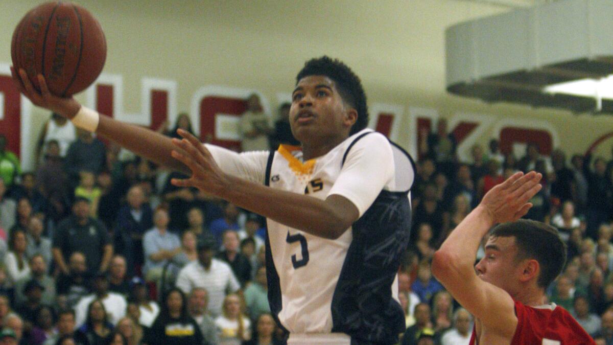 Bishop Montgomery's Ethan Thompson puts up a shot during the Knights' loss to Mater Dei in the CIF Southern Section Open Division semifinals on March 18.