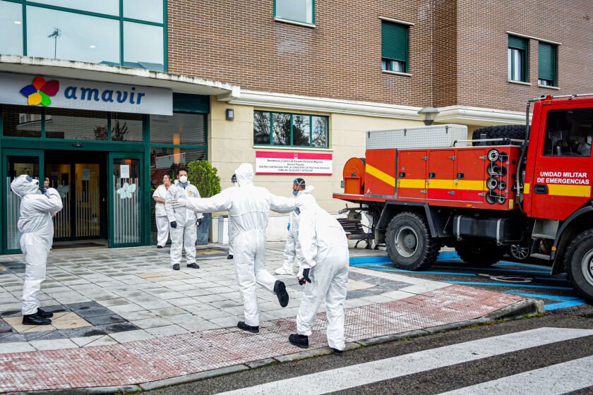 MADRID, SPAIN - MARCH 23: Soldiers from the EMU at the entrance to the Amavir Retirement Home in Pozuelo de Alarcon, where today they will carry out disinfection tasks to prevent the spread of the coronavirus in retirement homes on March 23, 2020 in Madrid, Spain. (Photo by Ricardo Rubio/Europa Press via Getty Images)
