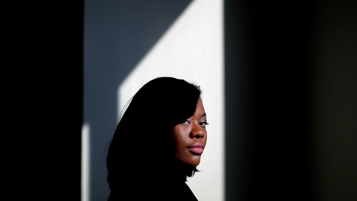 Sharonda Fields, who said she was abused while working at a Georgia restaurant last year, is photographed at her attorney's office in Atlanta on Dec. 4