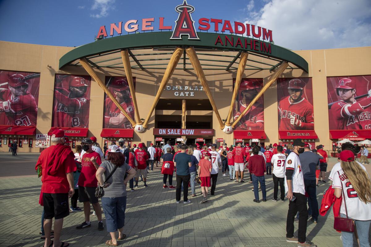ANAHEIM, CA - APRIL 1, 2021: Fans line up to enter Angel Stadium for the Angels home opener.