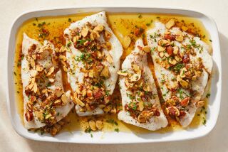 Fish almondine, a nutty variation on a French classic, sole meuniere.