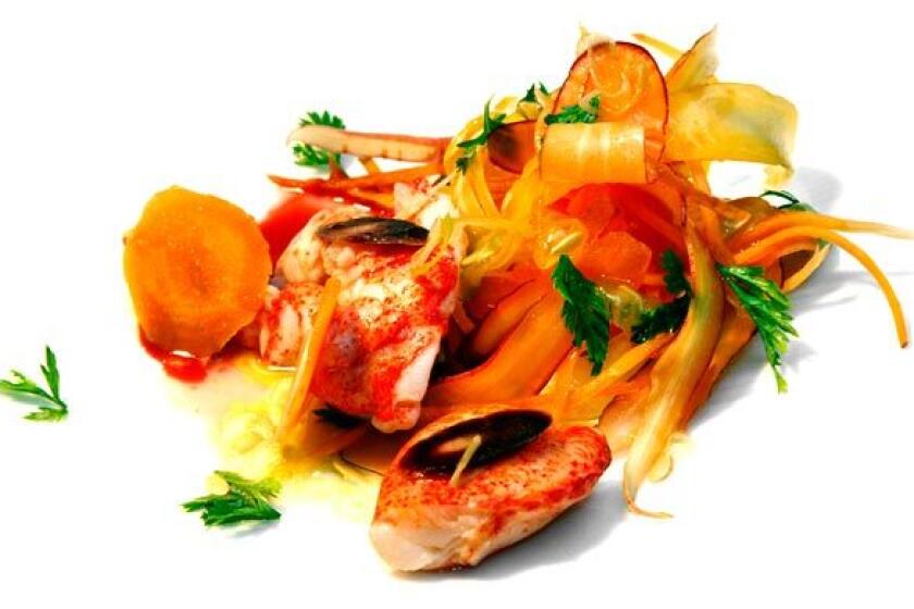 Butter-poached lobster is paired with carrots.