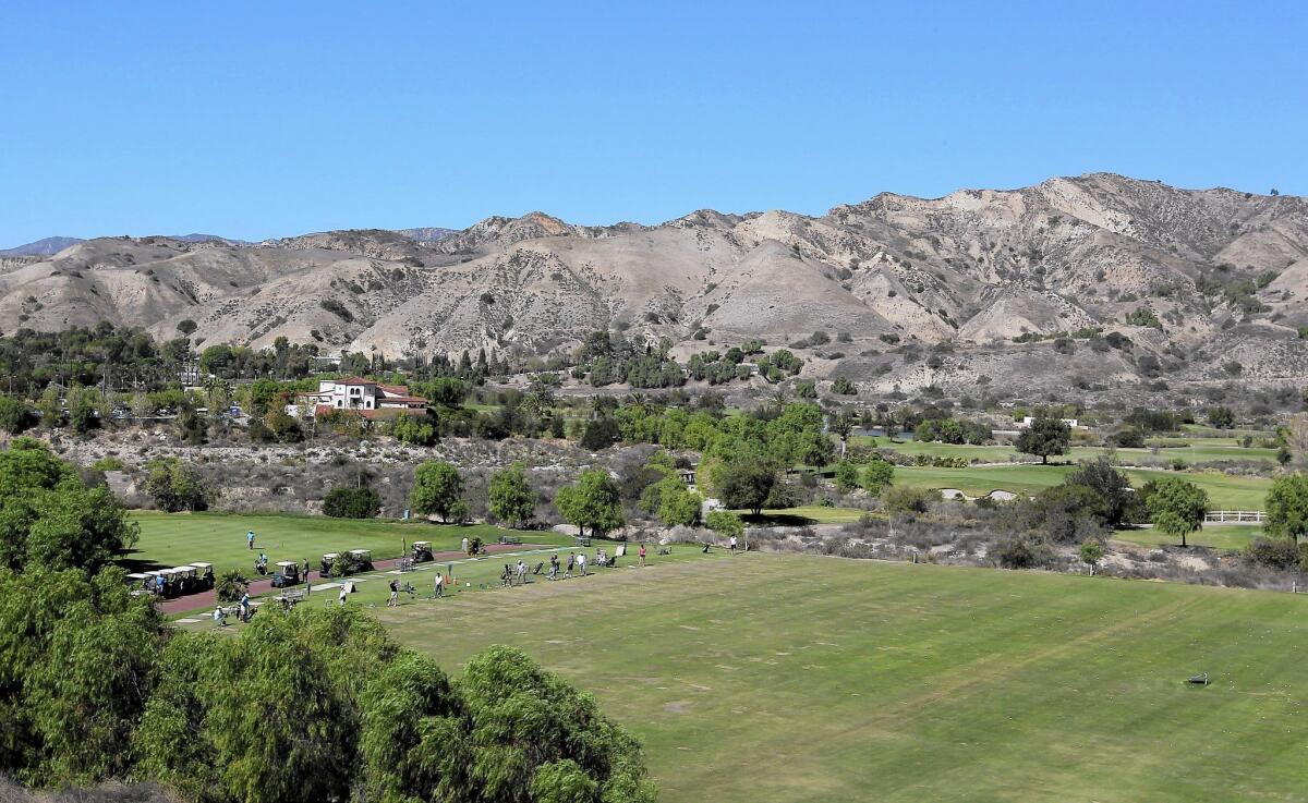 The mountains above the Angeles National Golf Club in Sunland are along one of four proposed tunnel routes.