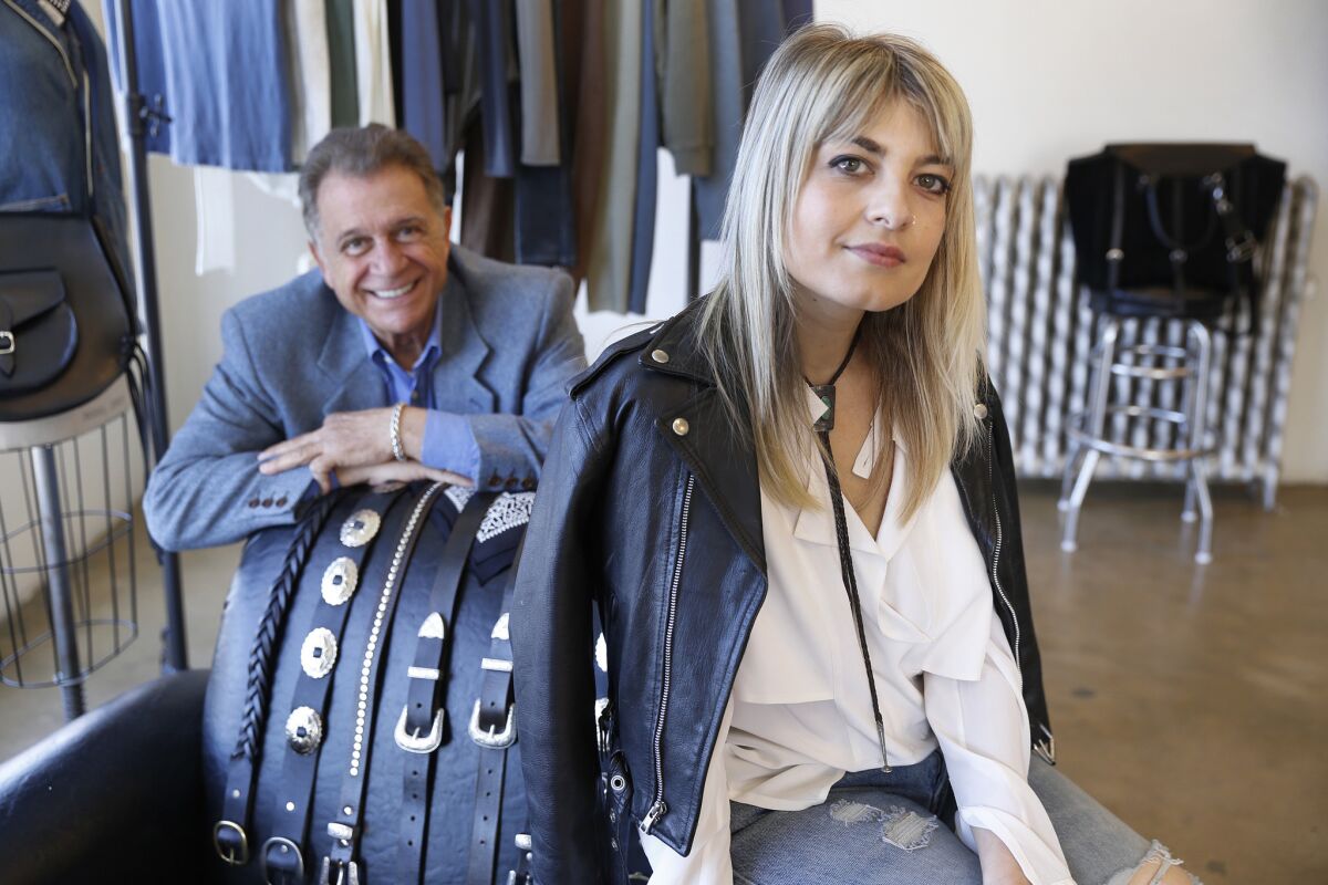 Armand Marciano with designer Cinzia Simone have joined forces with brother Georges Marciano (not pictured) of Guess jeans fame, to create a new upscale clothing brand called GM Studio with a fashion goods line for the Fall 2016 season.