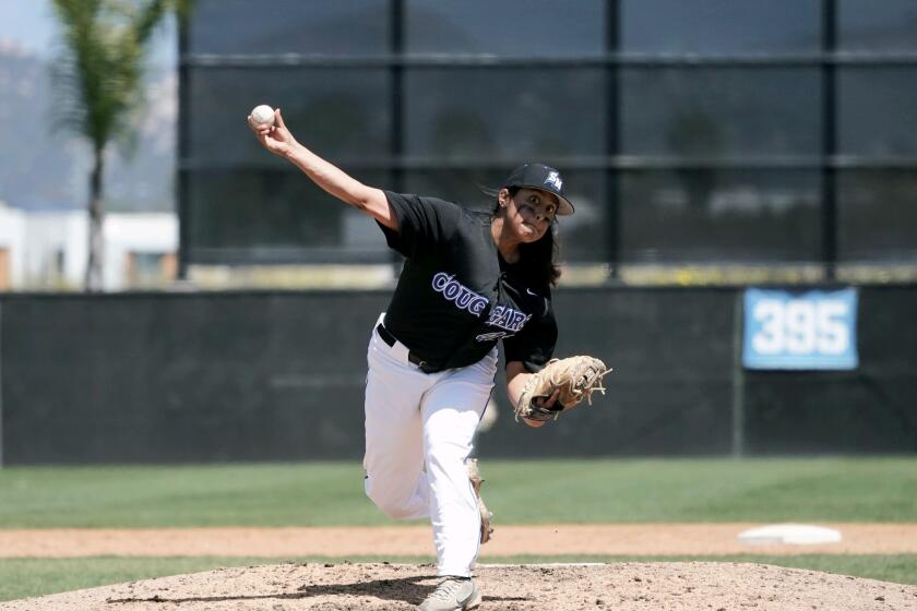 Jillian Albayati pitches during Sunday's baseball game between Cal State San Marcos and Sonoma State.