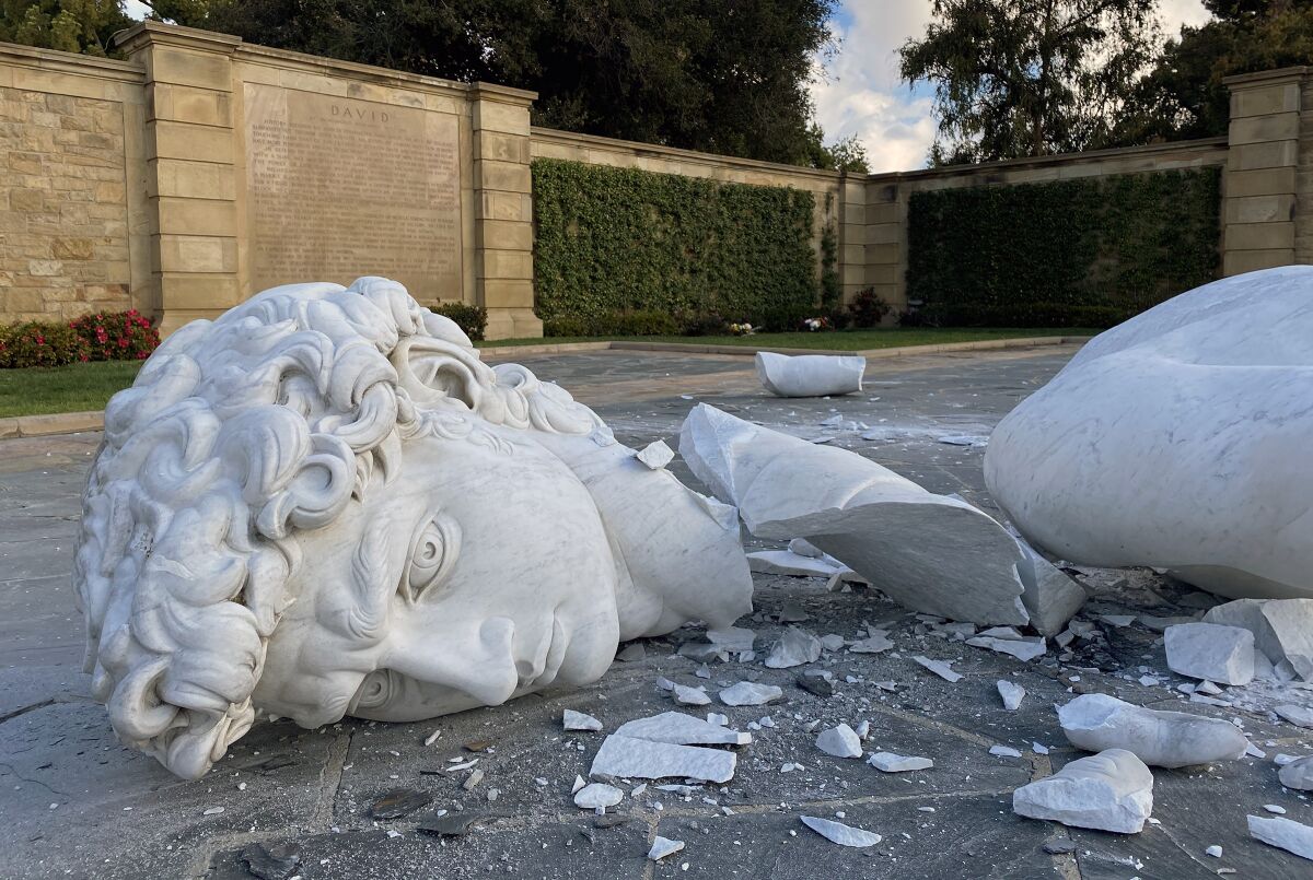 A closer look at the broken marble head of Forest Lawn Memorial Park’s reproduction of Michelangelo’s David. The statue was found shattered in pieces on Sunday morning, seemingly having fallen over on its own accord. 