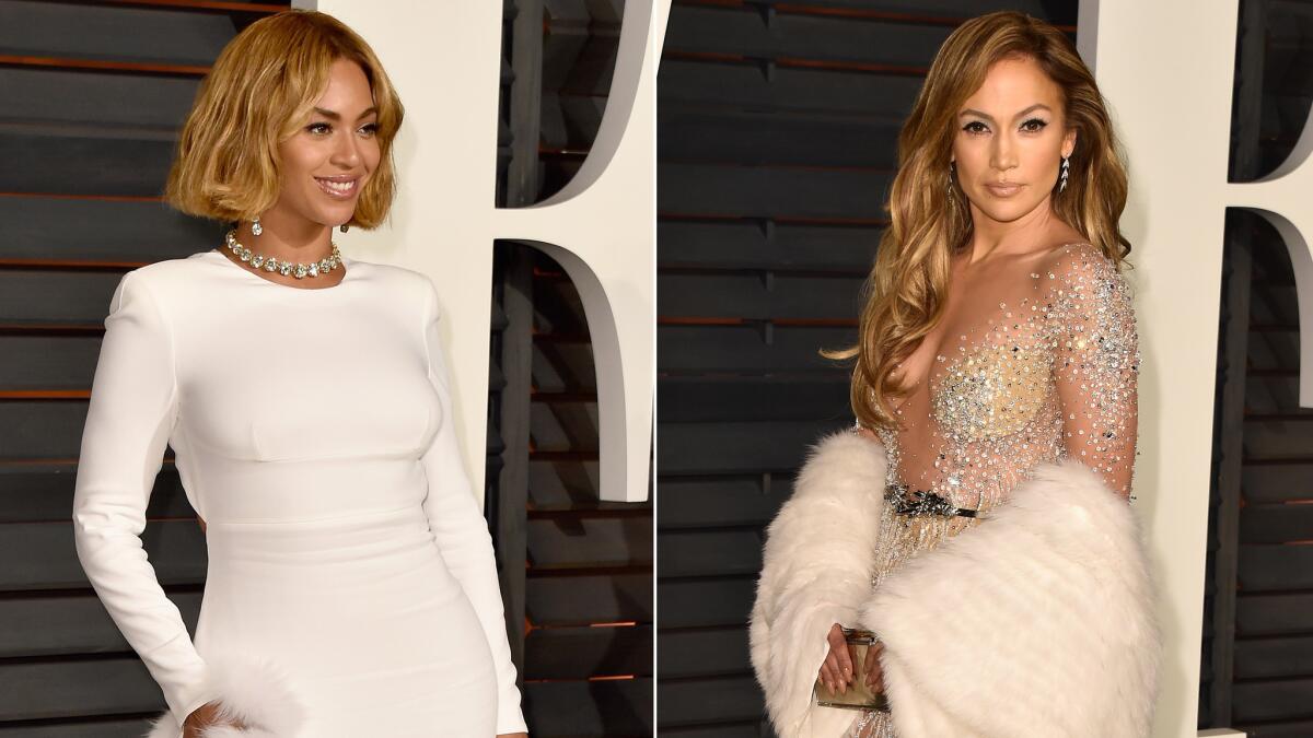 Beyonce, left, and Jennifer Lopez made a big splash at the 2015 Vanity Fair Oscar Party on Sunday in Beverly Hills.