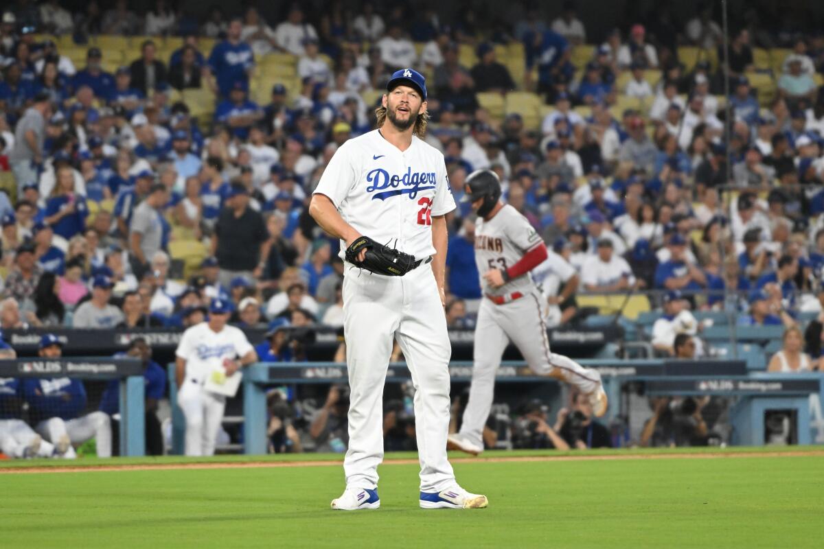 Dodgers pitcher Clayton Kershaw reacts after giving up a home run in the first inning at Dodger Stadium.