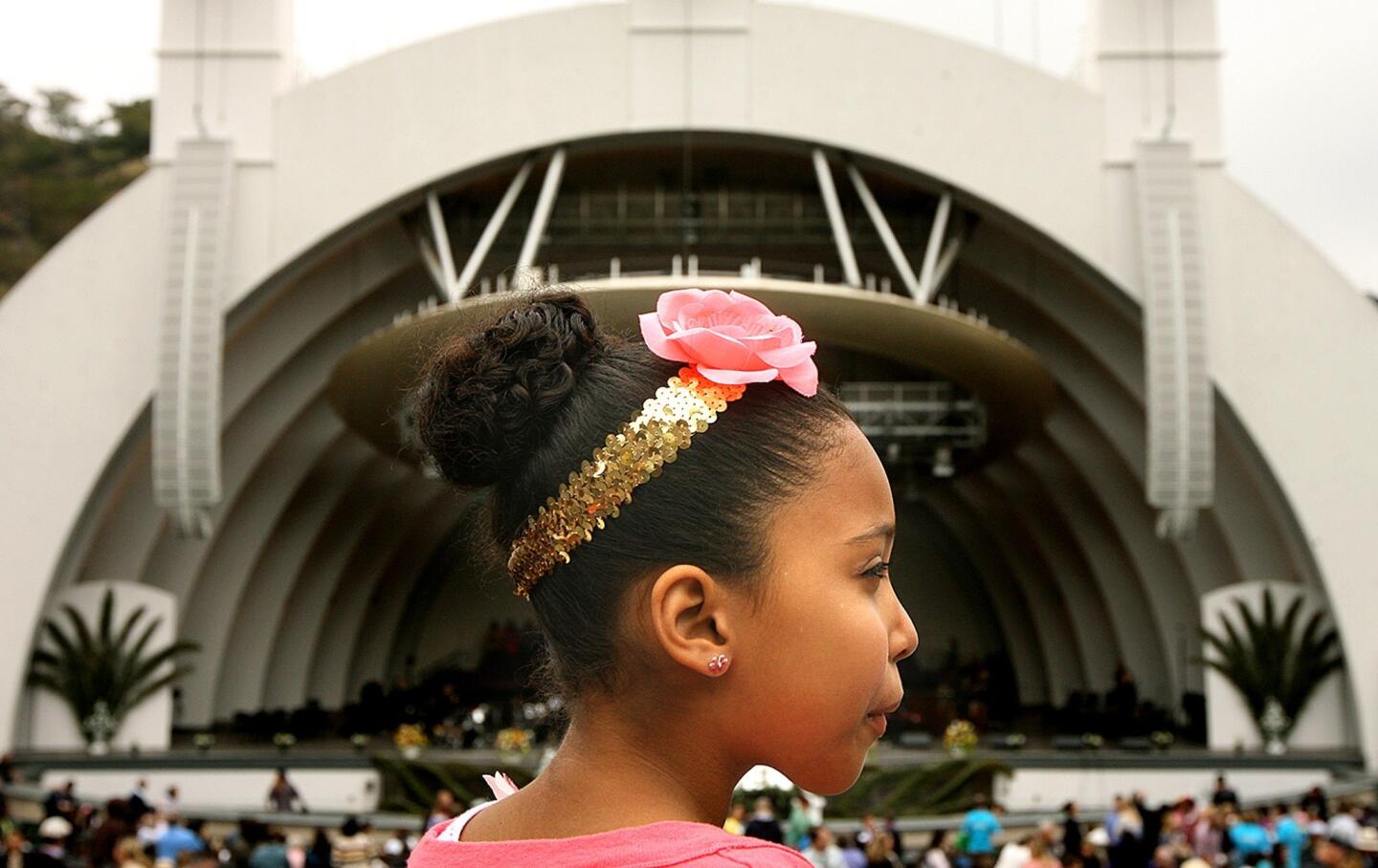 Jeannine Briggs, 9, of Pasadena attends Easter services at the Hollywood Bowl, presented by Bel Air Presbyterian Church and Christian Assembly Church in Eagle Rock.