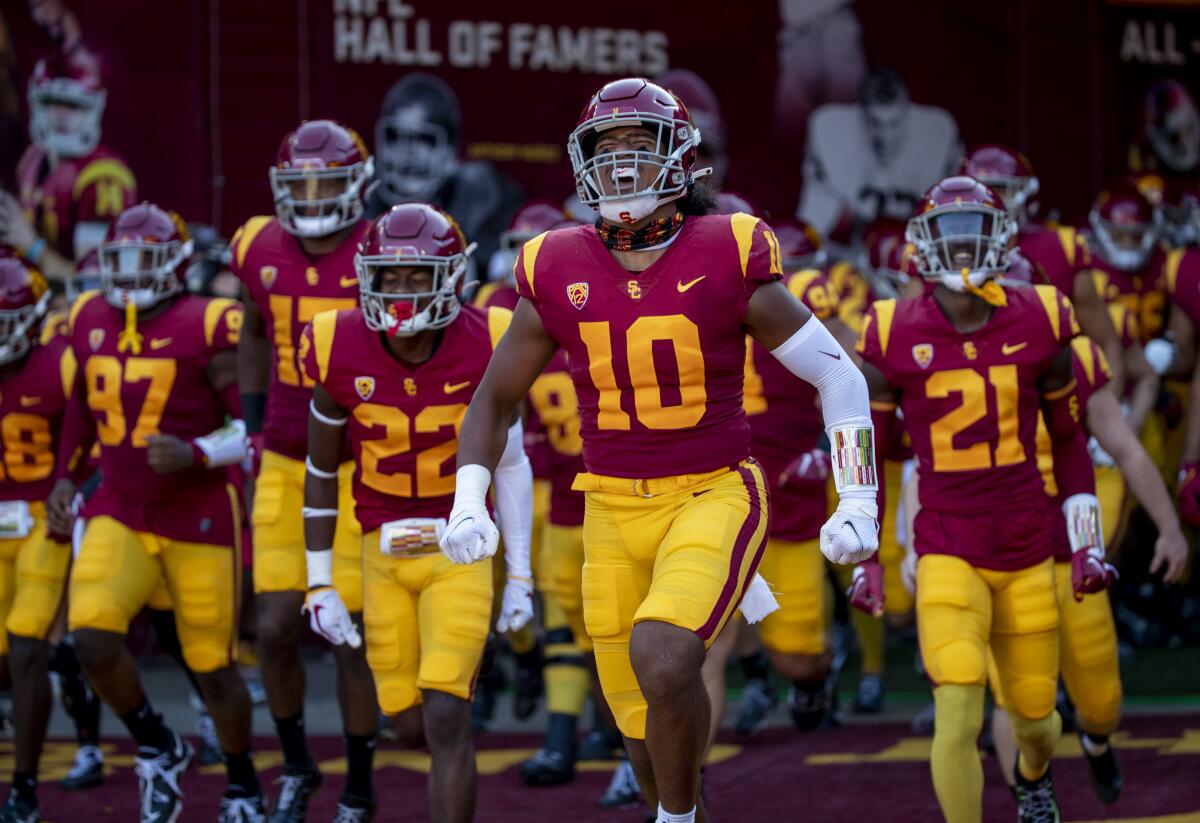 USC wide receiver Kyron Hudson leads his teammates onto the field before a game against Washington State on Oct. 8.