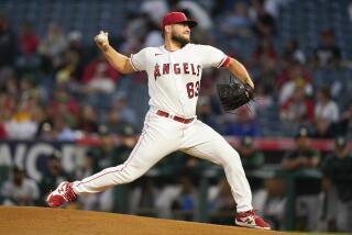 Los Angeles Angels starting pitcher Chase Silseth throws during the first inning.