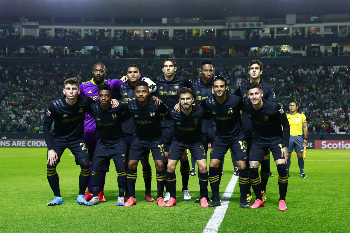 LAFC players pose before their CONCACAF Champions League match against León on Tuesday.