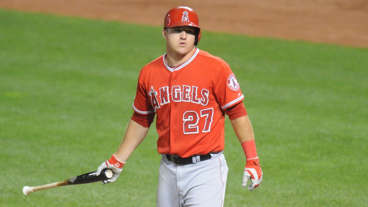 Angels center fielder Mike Trout reacts after striking out during the eighth inning of the team's 4-3 loss to the Baltimore Orioles on Wednesday.