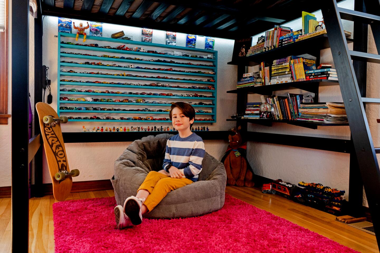 Actor Paxton Booth in his room.