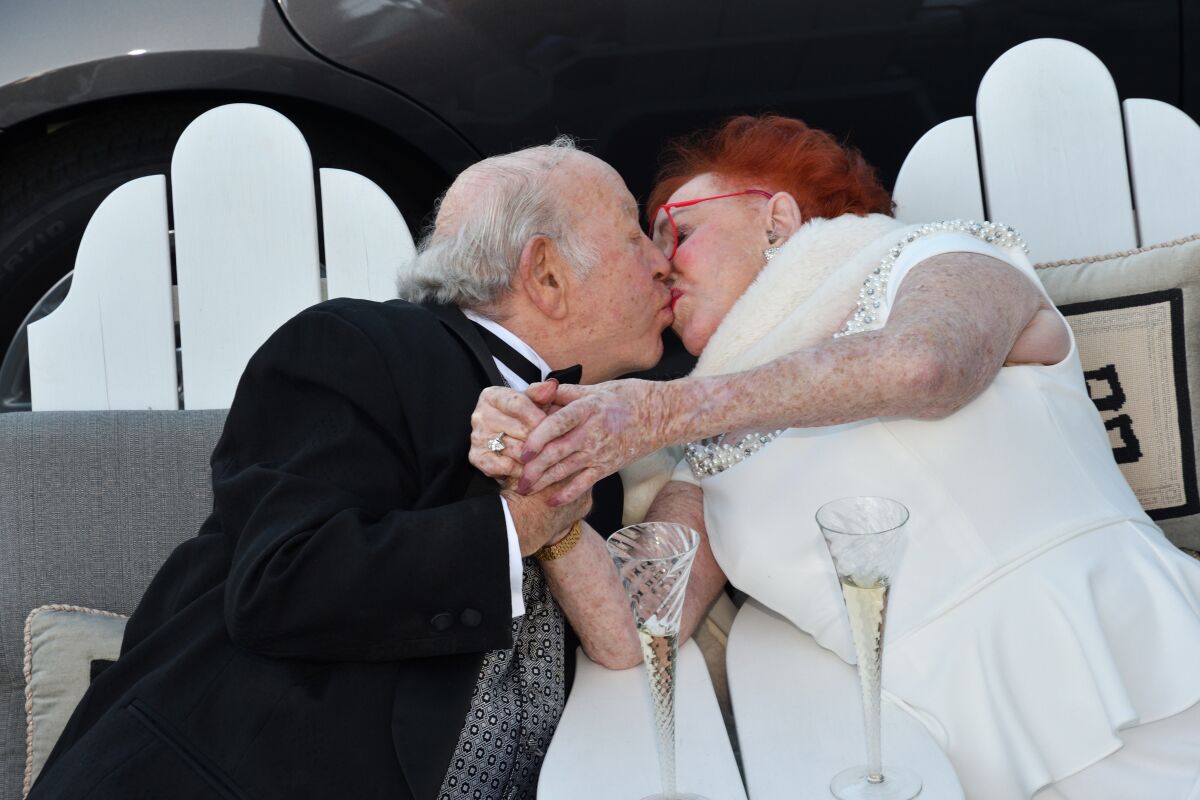 With their wedding vows renewed, Jim and Joy Furby share a kiss.