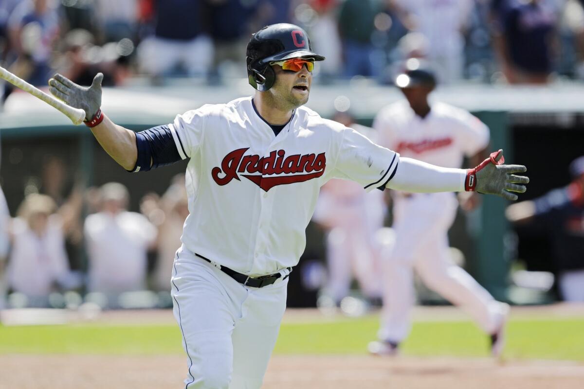 Nick Swisher turned a bad pitch from Ernesto Frieri into a walk-off grand slam for the Indians in a 5-3 loss for the Angels in the 10th inning.