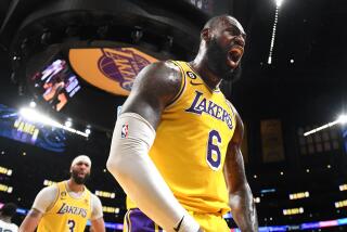Los Angeles, California April 24, 2023-Lakers LeBron James celebrates his basket after being fouled by a Grizzlie player in overtime in Game 4 of the NBA playoffs at Crypto.com arena Monday. (Wally Skalij/Los Angeles Times)