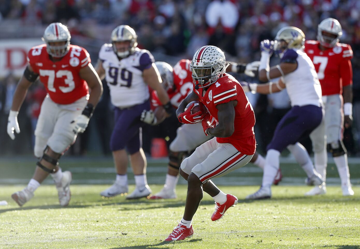 Ohio State wide receiver Johnnie Dixon III turns upfield after making a catch against Washington on Jan. 1 at the Rose Bowl Game in Pasadena.