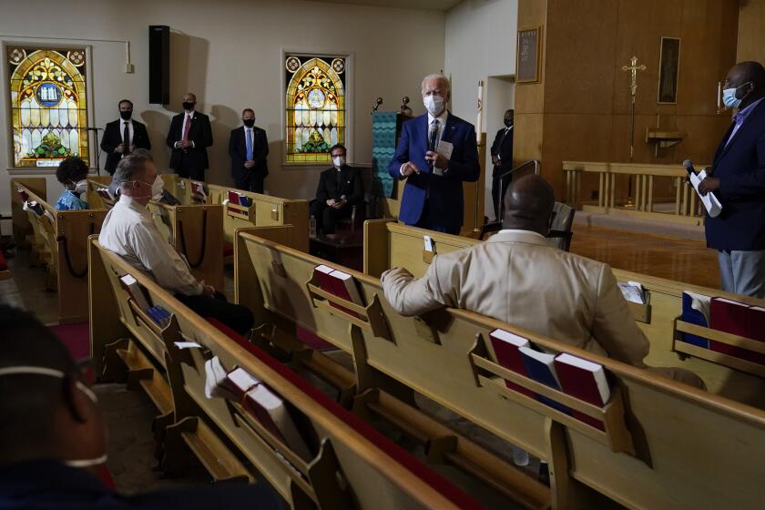 Democratic presidential candidate former Vice President Joe Biden speaks as he meets with members of the community at Grace Lutheran Church in Kenosha, Wis., Thursday, Sept. 3, 2020. (AP Photo/Carolyn Kaster)