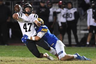 La Puenta, California November 4, 2022-Murrieta Valley quarterback Bear Bachmeier gets a pass.